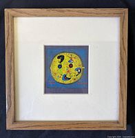 Full view of framed woodblock print
