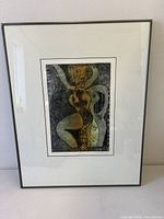 Full front view of framed print showing frame and mat