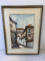 Full frontal view of framed Granada cityscape painting