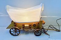 Lamp illuminated with fabric canopy shade lit