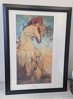 Full view of framed Mucha print with mat and frame