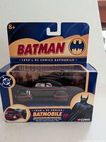 Front of boxed 1:43 Batmobile showing vehicle and branding