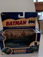 Front of boxed Corgi 2000 Batmobile showing Batman branding