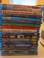 Stack of 14 Blu-ray cases front spines visible