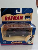 Front view of boxed Catmobile showing Batman branding and model inside