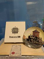 Overall view showing plate, box, certificate