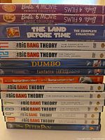 Stack of DVD cases showing titles in lot