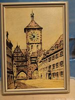 front view showing printed scene with clock tower and integrated clock face