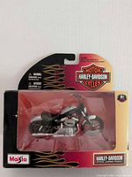 Front view of sealed Maisto Harley-Davidson die-cast motorcycle in package