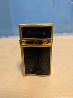 Front view showing black textured panel, Eiffel Tower motif and PARIS inscription