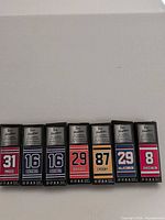 Front view of seven unopened Tim Hortons stick boxes