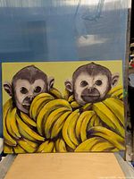 Front view of painting showing monkeys and bananas