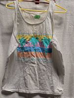 Front view of white tank top with Maui palm tree graphic