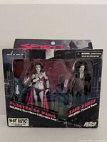 Front view of unopened The Spirit action figure 2-pack showing figures and accessories