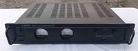 Front view showing full unit with handles and vented top