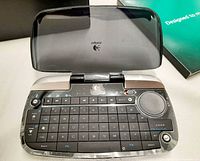 Keyboard open showing keys, ClickPad and lid