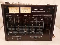 Front view showing complete Realistic stereo mixing console with meters, sliders, knobs and power indicator