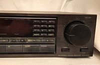 Front right view showing display, controls, volume knob