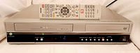 Front view of Toshiba D-VR5SC combo with remote on top