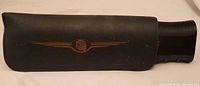 Black sleeve with gold Chrysler winged logo