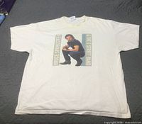 Full view of T-shirt front with Springsteen graphic and tour text