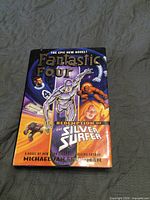 Front cover showing title, characters, author