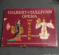 Box lid showing Gilbert & Sullivan Opera The Mikado Model Theatre artwork