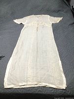 Full view of front of dress laid flat