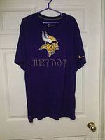 Front view showing team logo and Just Do It graphic