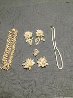 All items arranged on flat surface showing full lot
