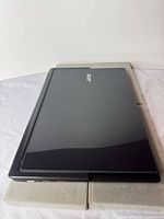 Closed top view of Acer laptop showing exterior finish