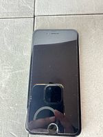 Front view of Apple iPhone 6/6s with screen off