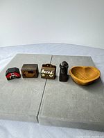 all five wooden decor pieces lined up
