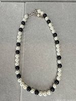 Full necklace laid flat showing bead pattern and length
