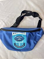 Front view of blue Bud Light fanny pack with zipper and strap