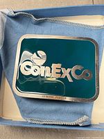 Front view showing ConExCo logo and teal enamel