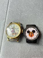 Both watch heads side by side