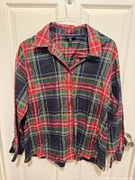 Front view of Foxcroft plaid long sleeve shirt on hanger
