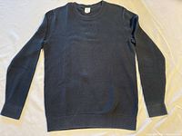 Front view of GAP black crew neck sweater