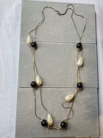 Full view of necklace showing bead arrangement and length