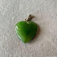 Front view of green heart pendant