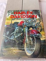 Front cover showing title and motorcycle image