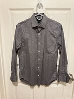 Front view of gray check J.Crew dress shirt on hanger