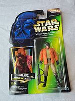 Front view of sealed carded Ponda Baba action figure with accessories