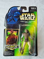 Front view of sealed Kenner Power of the Force Weequay Skiff Guard figure on card