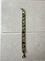 Full view of bracelet showing length, stone pattern, and toggle clasp
