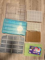 All six organizers laid out showing sizes, colors and compartments