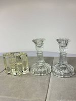 All three pressed glass holders displayed together