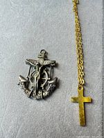 Anchor ship-wheel pendant and gold-tone cross pendant with chain