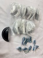 All eight bagged cup pulls with screw packets